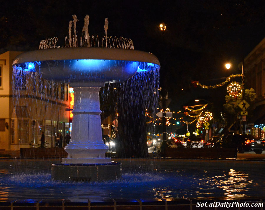 Orange circle water fountain Christmas blue lights