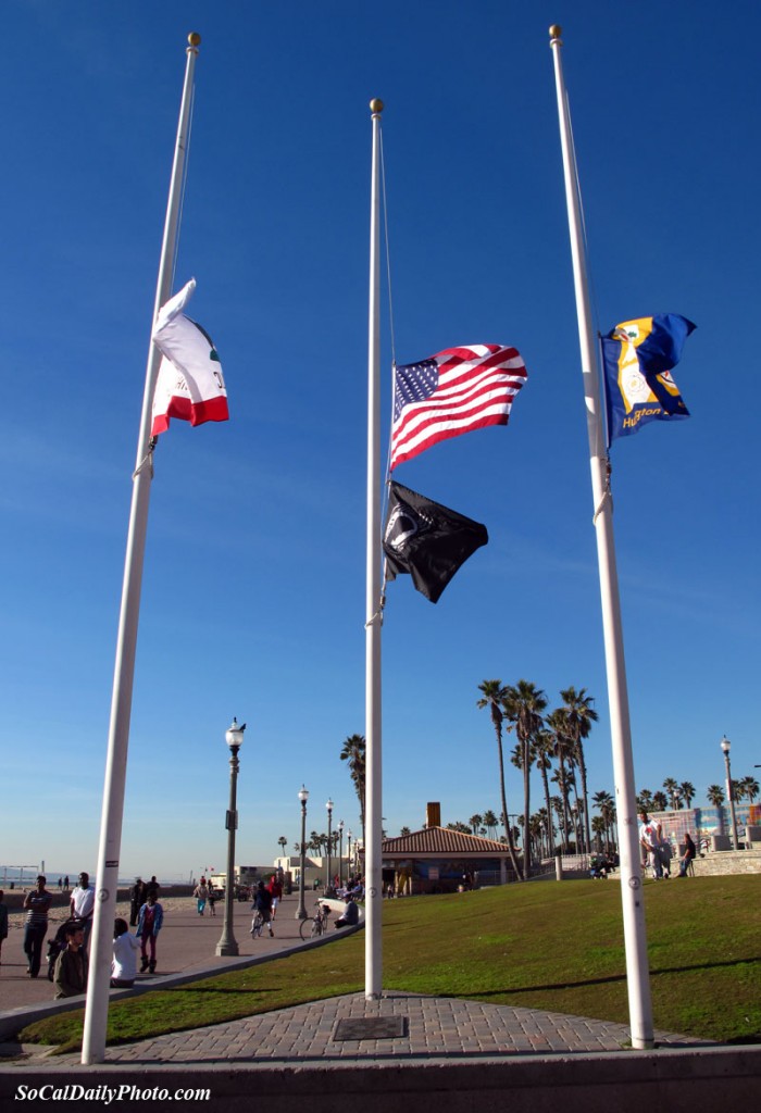 Huntington Beach Pier flags at half staff in Honor of Tucson Arizona Victims
