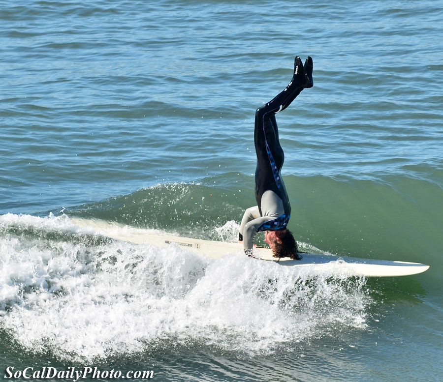 Huntington Beach surfer in a headstand